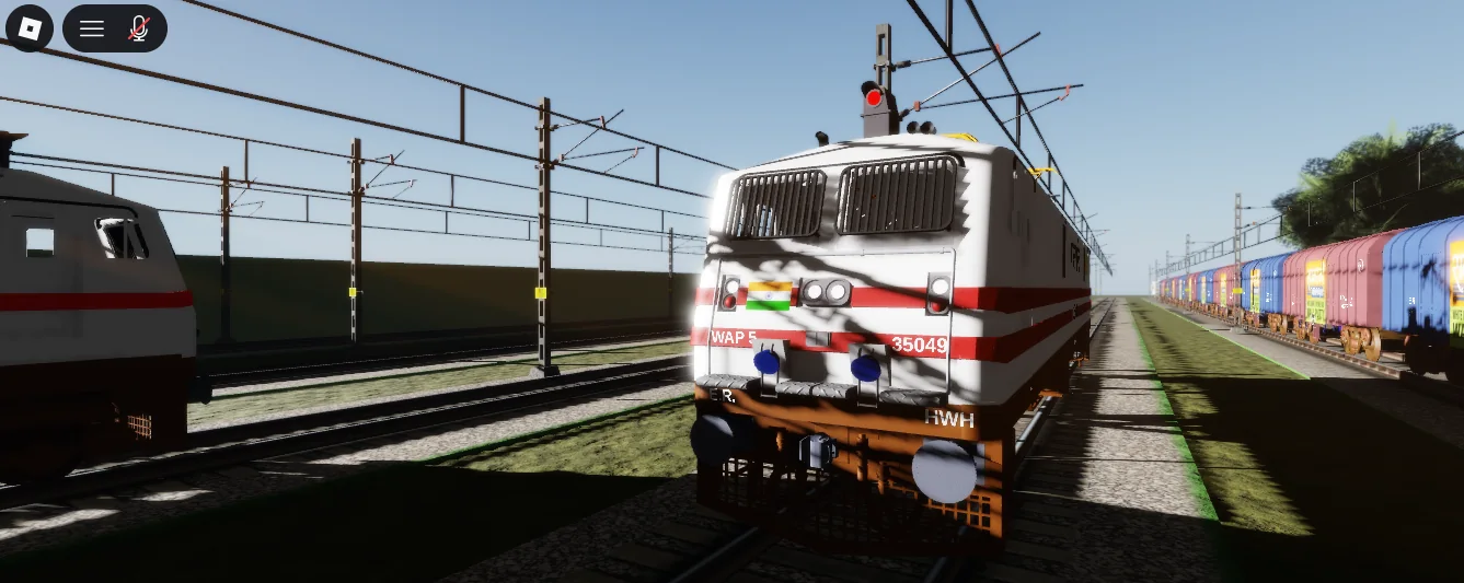 WAP-5 35049 beside freight wagons