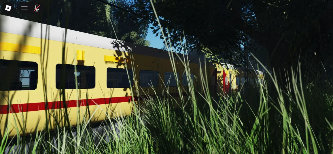 Yellow and red ICF Utkrisht passenger train